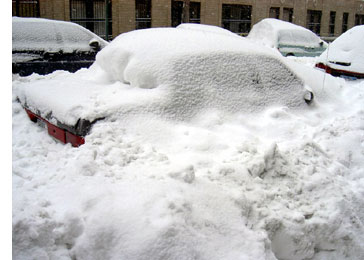 Car burried on 100th Street