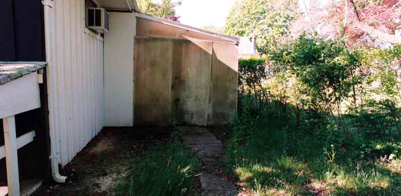 Behind the shed.